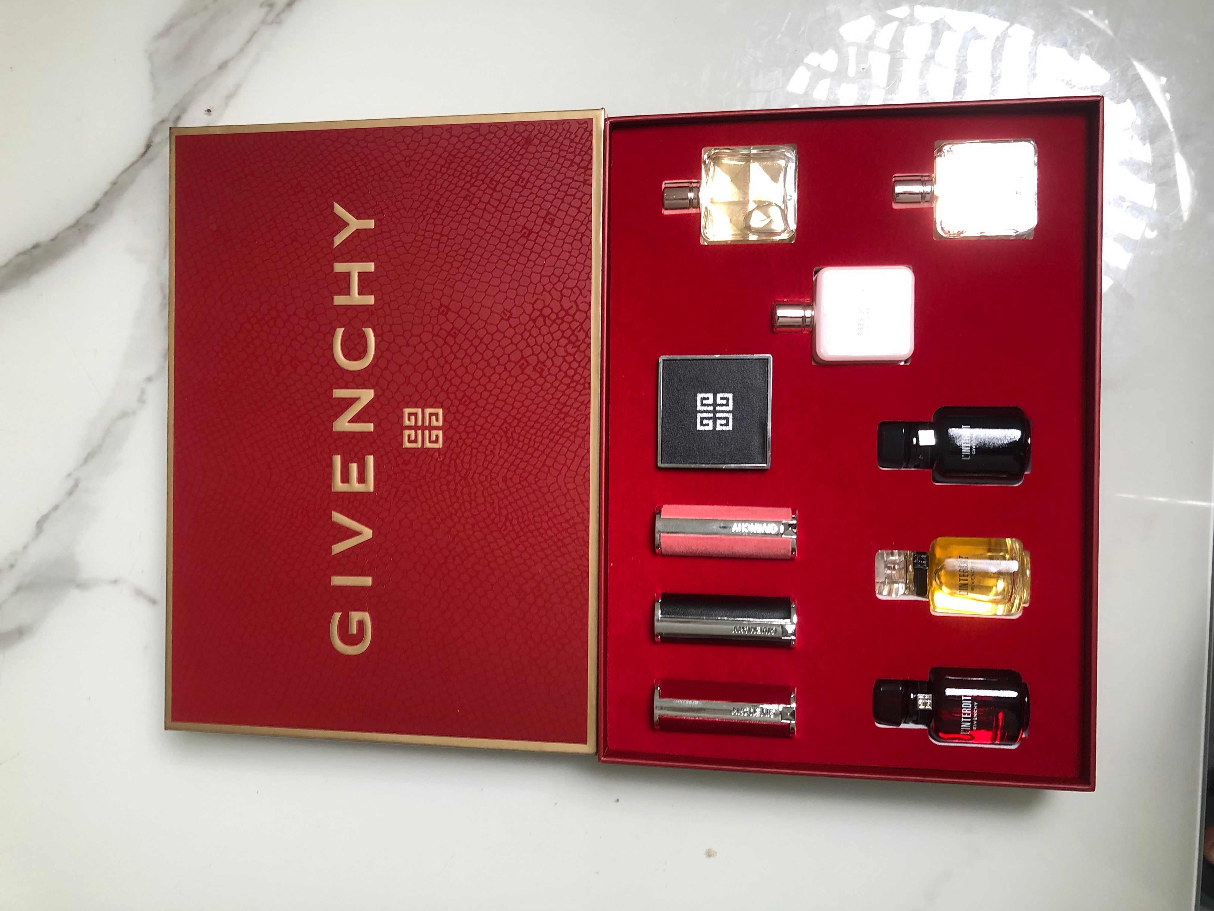 Gift-set product photo — US-288 — Catalogue name: Givenchy 10-Piece Beauty Gift Set Perfume + Lipstick + Powder — Capacity shown: As pictured: perfumes 10ml × 3 + 8ml × 3; lipsticks 1.5g × 3; loose powder 4 × 1.5g