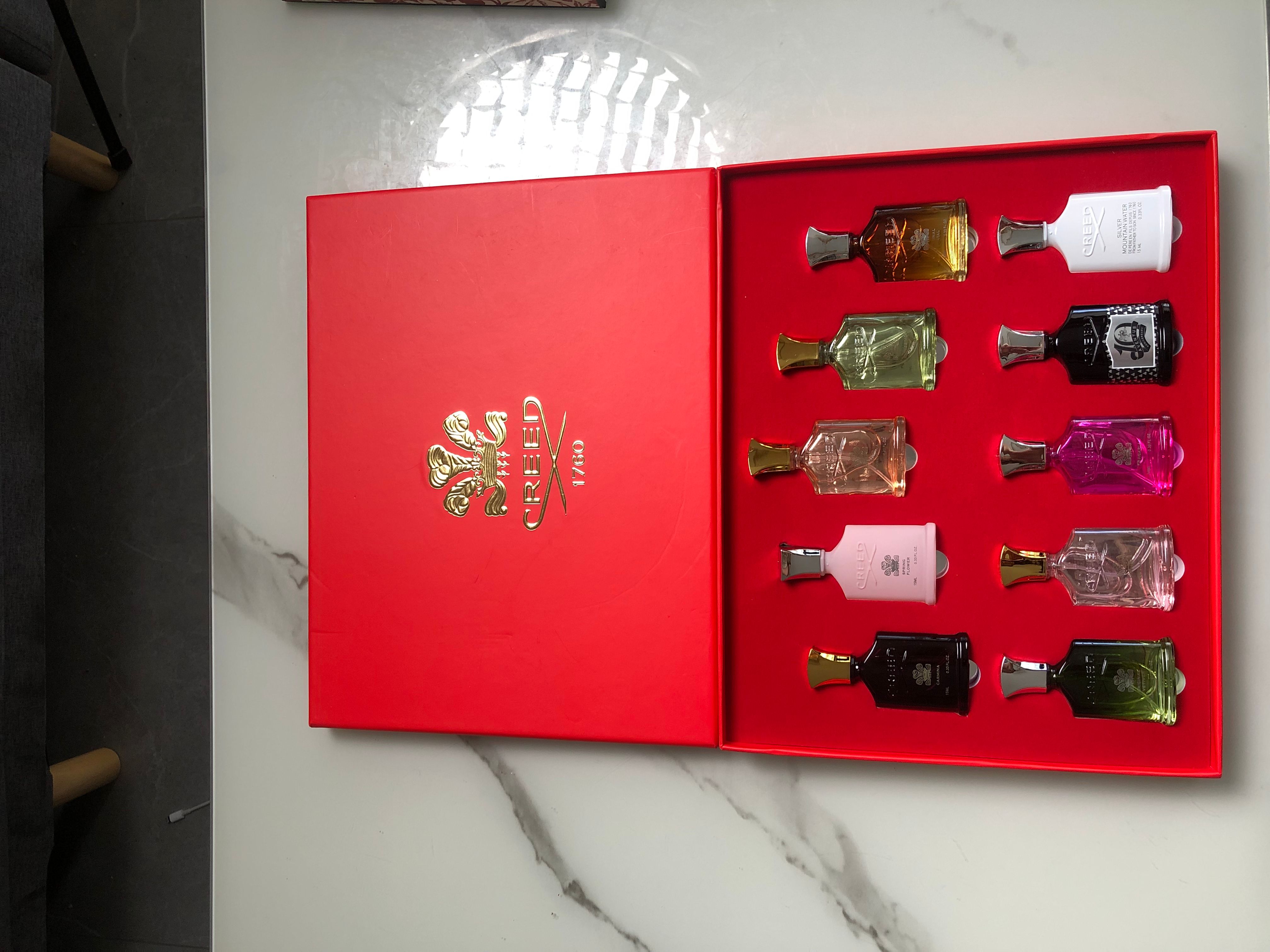 Gift-set product photo — US-290 — Catalogue name: Creed 10-Piece Mini Perfume Gift Set Red Box Collection — Capacity shown: 10ml × 10